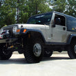 Load image into Gallery viewer, Superlift 97-06 Jeep Wrangler TJ w/ 3-4.5in Lift Kit Adjustable Track Bar - Front - Side View