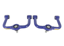 Load image into Gallery viewer, Superpro 05-21 Nissan Frontier - Fixed Offset Upper Control Arm Set - Camber/Caster Correction - Side View