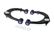 Load image into Gallery viewer, Superpro 08-21 Toyota Land Cruiser Front Upper Control Arm Set - Installation View