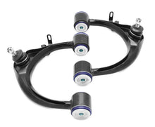 Load image into Gallery viewer, Superpro 98-07 Lexus LX470 / 98-07 Toyota Land Cruiser Front Upper Control Arm Set - Installation View