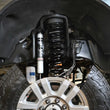 Load image into Gallery viewer, Synergy 05+ Ford Super Duty F-250 / F-350Ax4 Diesel Leveling System - Side View