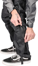 Load image into Gallery viewer, Thrashin Supply Co. Mission Rain Pants - Black - L/XL - Installation View