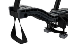 Load image into Gallery viewer, Thule Compass 4-in-1 Water Sport Roof Top Carrier (w/Integrated StrapCatch) - Black - Installation View
