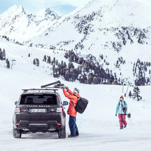 Load image into Gallery viewer, Thule SnowPack Extender Slide-out Ski/Snowboard Rack (Up to 6 Pair Skis/4 Snowboards) - Black - Back View