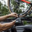 Load image into Gallery viewer, Thule TopRide Fork-Mounted Roof Bike Rack (Fits 9-15mm Thru-Axle &amp; Standard 9mm Quick-Release Bikes) - Installation View