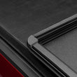 Load image into Gallery viewer, Tonno Pro 04-15 Nissan Titan 5.5ft (Incl 42-498 Utility Track Kit) Hard Fold Tonneau Cover - Side View