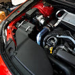 Load image into Gallery viewer, Torque Solution 2022+ Subaru WRX / 19-23 Subaru Ascent Titanium Top Mount Charge Pipe - Burnt Blue - Installation View