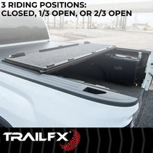 Load image into Gallery viewer, TrailFX Hard Tri Fold Non-Lockable Black Aluminum With Carpeted Under Panels TFX3705 - Additional View 7
