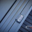 Load image into Gallery viewer, Truck Covers USA American Roll Cover - Hard Retractable Roll-up Tonneau Cover - Side View