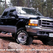 Load image into Gallery viewer, Tuff Country 00-04 Ford F-350 Super Duty 4x4 3in Front Lift Kit (No Shocks) - Side View