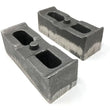 Load image into Gallery viewer, Tuff Country 01-10 Chevy Silverado 2500HD/3500 4wd 2in Cast Iron Lift Blocks Pair - Main Product View