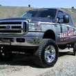 Load image into Gallery viewer, Tuff Country 05-07 Ford F-250 Super Duty 4x4 5in Lift Kit (SX8000 Shocks) - Back View