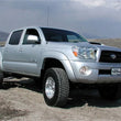 Load image into Gallery viewer, Tuff Country 05-23 Toyota Tacoma 4x4 &amp; PreRunner 3in Lift Kit (Excludes TRD Pro) SX6000 Shocks - Installation View