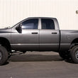 Load image into Gallery viewer, Tuff Country 09-13 Dodge Ram 2500/3500 Front 4.5in Arm Lift Kit - Back View