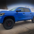 Load image into Gallery viewer, Tuff Country 14-20 Toyota Tundra TRD Pro 4x4 &amp; 2wd 2.5in Uni-Ball Lift Kit - Side View