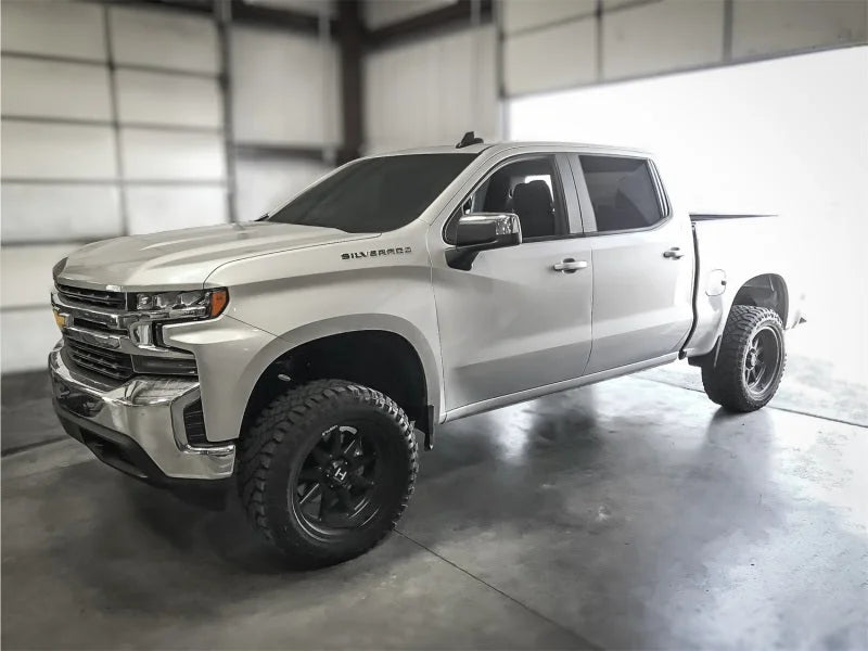 Tuff Country 19-23 Chevy 1500 4x4 4in Lift Kit w/ Upper Control Arms - Side View
