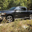 Load image into Gallery viewer, Tuff Country 19-23 Dodge Ram 1500 2in Front Leveling Kit with Ride Height Sensor Links - Side View
