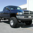 Load image into Gallery viewer, Tuff Country 2001 Dodge Ram 1500 4x4 4.5in Lift Kit (SX8000 Shocks) - Side View
