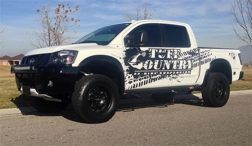 Tuff Country 04-15 Nissan Titan 4wd 4in Lift Kit (SX8000 Shocks) - Side View