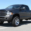 Load image into Gallery viewer, Tuff Country 94-01 Dodge Ram 1500 4wd 2in Leveling Kit Front (SX8000 Shocks) - Side View