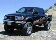 Load image into Gallery viewer, Tuff Country 95-04 Toyota Tacoma 4x4 &amp; PreRunner 5in Lift Kit (SX6000 Shocks) - Back View