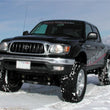 Load image into Gallery viewer, Tuff Country 95-04 Toyota Tacoma 4x4 &amp; PreRunner 5in Lift Kit (SX6000 Shocks) - Installation View