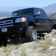 Load image into Gallery viewer, Tuff Country 99-04 Toyota Tundra 4x4 &amp; 2wd 4.5in Lift Kit (SX6000 Shocks) - Installation View