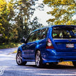 Load image into Gallery viewer, Turbo XS 04-08 Forester 2.5 XT Cat Back Exhaust - Side View