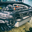 Load image into Gallery viewer, Turbo XS FMIC 2015-2017 Subaru STi - Wrinkle Red Pipes - Installation View