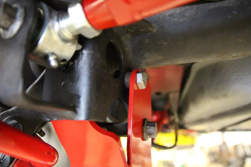 UMI Performance 05-14 Ford Mustang Rear Control Arm Relocation Brackets- Bolt In - Side View