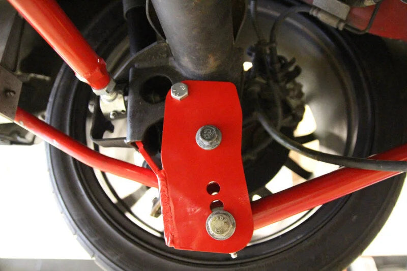UMI Performance 05-14 Ford Mustang Rear Control Arm Relocation Brackets- Bolt In - Back View