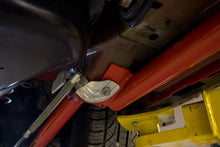 Load image into Gallery viewer, UMI Performance 05-14 Ford Mustang Subframe Connectors- Bolt In - Installation View