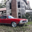 Load image into Gallery viewer, UMI Performance 64-72 GM A-Body 2in Lowering Spring Set Front - Installation View