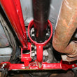 Load image into Gallery viewer, UMI Performance 82-92 GM F-Body Tunnel Mounted Torque Arm- Fits TH400 Transmission - Installation View