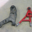 Load image into Gallery viewer, UMI Performance 93-02 GM F-Body Front Adjustable Lower A-Arms - Drag - CrMo - Installation View