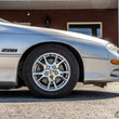 Load image into Gallery viewer, UMI Performance 93-02 GM F-Body Lowering Springs Front 1.25in Lowering - Side View