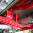 Load image into Gallery viewer, UMI Performance 93-02 GM F-Body Tunnel Brace Mount Long Tube Header Set-Ups w/ Loop - Back View