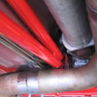Load image into Gallery viewer, UMI Performance 93-97 GM F-Body Automatic / Torque Arm Relocation Kit - Installation View
