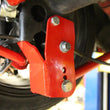 Load image into Gallery viewer, UMI Performance Rear Control Arm Relocation Brackets - Bolt In fits 2005-2014 Ford Mustang - Installation View
