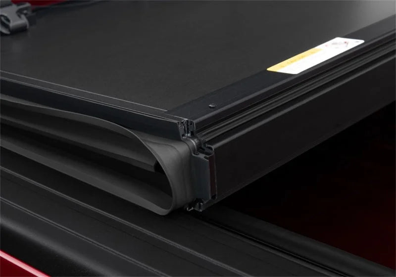 UnderCover 02-18 Dodge Ram 1500 (w/o Rambox) (19 Classic) 6.4ft Armor Flex Bed Cover- Black Textured - Side View