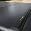 Load image into Gallery viewer, UnderCover 04-21 Ford F-150 5.5ft Triad Bed Cover - Installation View