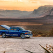 Load image into Gallery viewer, UnderCover 05-15 Toyota Tacoma 5ft SE Smooth Bed Cover - Ready To Paint (Req Factory Deck Rails) - Installation View