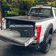 Load image into Gallery viewer, UnderCover 17-20 Ford F-250/F-350 Passengers Side Swing Case - Black Smooth - Installation View