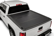 Load image into Gallery viewer, UnderCover 2020 Chevy Silverado 2500/3500 HD 6.9ft Ultra Flex Bed Cover - Side View