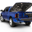 Load image into Gallery viewer, UnderCover 99-16 Ford F-250/F-350 Passengers Side Swing Case - Black Smooth - Main Product View