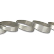 Load image into Gallery viewer, Vibrant 2.5in. O.D. Titanium Pie Cuts - Bag of 5 - Side View
