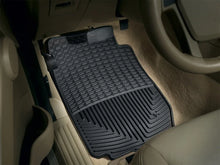 Load image into Gallery viewer, WeatherTech 02-05 Ford Explorer Front Rubber Mats - Black - Installation View