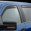 Load image into Gallery viewer, WeatherTech 04-08 Ford F150 Super Cab Front &amp; Rear Side Window Deflectors - Dark Smoke - Additional View 6