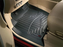 Load image into Gallery viewer, WeatherTech 04+ Nissan Armada Front FloorLiner - Black - Installation View