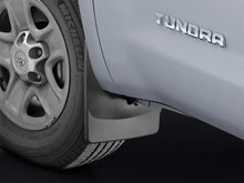 Load image into Gallery viewer, WeatherTech 07-13 Toyota Tundra No Drill Front Mudflaps - Installation View